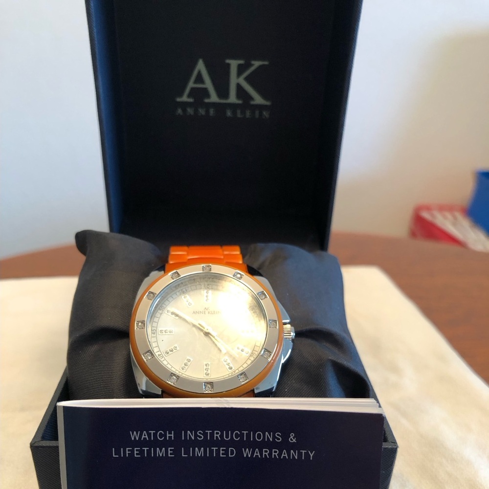 Anne Klein women's watch with Orange accent 10/9179 working watch Needs Battery!